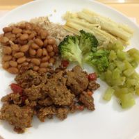 Some of the hot dishes options on Sunday: whole rice, beans, zucchini, seitan, palm heart, broccoli. at Boa Saude in Sao Paulo