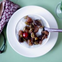 Rice pudding with fruit compote and coconut milk  at Sarangi Vegetarian Restaurant in Kathmandu