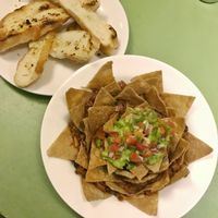dry as heck garlic bread, and mouldy nachos at Sarangi Vegetarian Restaurant in Kathmandu