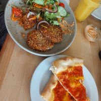 Lentil quinoa patties and pizza bread (basically a pizza with garlic haha) at Beim Olivenbauer in Fuessen