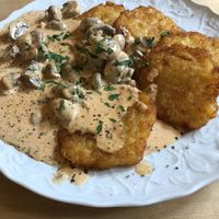 Potato pancakes with cream sauce and mushrooms at Beim Olivenbauer in Fuessen