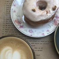 Oat café au lait and vegan donut  at Shakespeare and Company Cafe in Paris