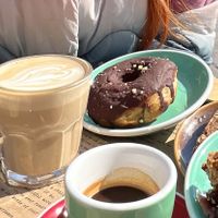 Oat latte, vegan donut   at Shakespeare and Company Cafe in Paris