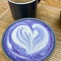 Purple latte with sweet potatoe, vanilla and oat milk  at Shakespeare and Company Cafe in Paris