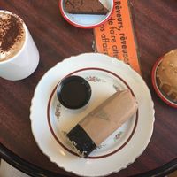 Chocolat chaud, vegan donut and sushi  at Shakespeare and Company Cafe in Paris