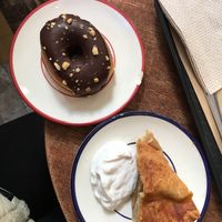 Glazed doughnut with peanuts and apple pie with coconut yoghurt  at Shakespeare and Company Cafe in Paris