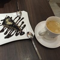 Chocolate cheesecake and black coffee at Tofunia in Taipei