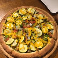 Colourful vegan pizza - good toppings but wasn't as keen on the base  at Tofunia in Taipei