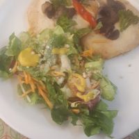 Mini pizza and salad at Bardana Equilibrio Natural in Rio De Janeiro