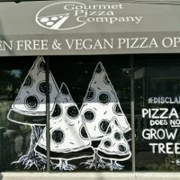 Storefront vegan advertising  at Gourmet Pizza Company in Tampa