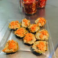 Delicious dehydrated bagels.  Herb loaded pumpkin seed pate served with carrot on top. Add amaranth sprouts for more beauty and flavor!
Learn how to do this with a wellness retreat that is offered there. at Ann Wigmore Natural Health Institute in Aguada