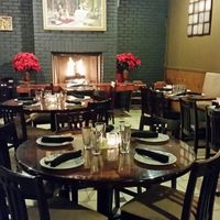 main dining room with cozy fire at Kathmandu Kitchen in Davis