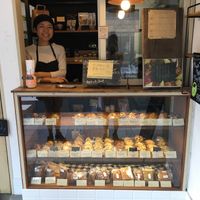 Staff and huge vegan selection  at Guruatsu in Tokyo