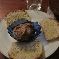 I ordered the ensalada de frijoles and got this bean dip with homemade bread and olive olive. It was very tasty. at La Redaccion in Trinidad