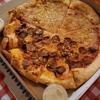 Half cheese half pepperoni at Mikey's Late Night Slice in Columbus