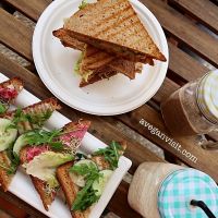 The club sandwich, cheese and beetroot humous toasties, acai-banana smoothie and the delicious banana and PB smoothie. at RawAttitude in Malaga
