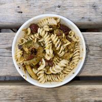 Pasta Salad ~ with harissa, courgette, fennel, olives + lemon  at Pilgrims Coffee House in Lindisfarne