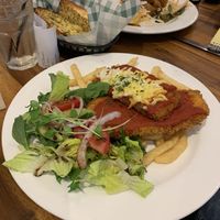 Eggplant (aubergine) Parma w chips  at The Green Lion Pub in Rozelle