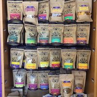 Look at this wall of deliciousness that’s actually GOOD for you too! at Lydia's Health Foods in Petaluma