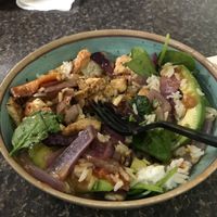Delicious Buddha bowl with fresh made Thai peanut dressing  at Tossed on Market in Corning