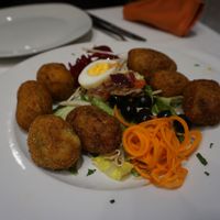 Bolitas de papa at Artemisa Sol - Huertas in Madrid