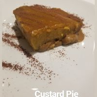 Vegan Custard Pie. Very sweet. I... liked it but not enough to finish it or ever order it again. at Artemisa Sol - Huertas in Madrid