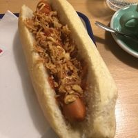 White Trash hot dog. Ketchup, mustard, and crispy onions.  at Munchies in Bordeaux