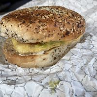 Just egg, guacamole, cream cheese, tomato bagel   at Bunkhouse Coffee Bar in Jensen Beach