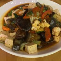 Shiitake & eggplant stir fry with extra firm tofu.  at May Kaidee in New York City