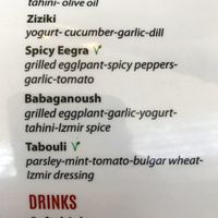 Green "v" means "vegan" at Cafe Izmir Mediterranean Tapas in Grapevine