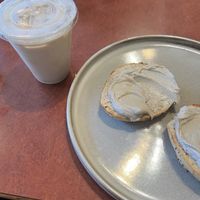 Iced soy chai and bagel with vegan cream cheesee  at Fancy Plants Cafe in Chicago