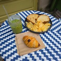 Peach matcha, grilled cheese sandwich, chocolate croissant at Fancy Plants Cafe in Chicago