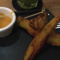 Potatoes with the vegan swiss cheese burger at La Raiz de la Tierra in Ixtapa