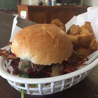 Breakfast burger and roast potatoes at Johnny Mack's Vegan Family Diner in Preston