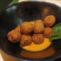 Coralinas ... Albóndigas de lentejas rojas y quinoa at La Huella Vegana in Alcala De Henares