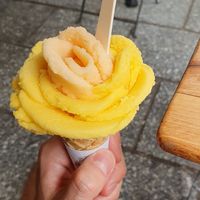 La vie en rose: Mandarine and melon ice cream. at Amorino - Cler in Paris