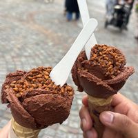 Chocolate sorbet in plain cone with hazlenut crunchies, (small)   at Amorino - Cler in Paris