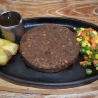 Tempeh steak with a pepper sauce at Mai3 Veggie Kitchen - Raya Tuban in Kuta
