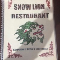 Menu cover at Snow Lion Hotel & Veg Restaurant in Dharamshala