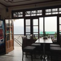 dining room in a monsoon afternoon  at Nick's Italian Kitchen in Dharamshala