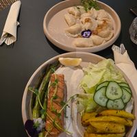 Potato smoked -tofu dumplings 😋  and smoked "salmon" with potatoes and cashew cheese at Raw Nest in Krakow