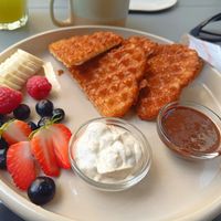 Waffles with fruit and dippings at Raw Nest in Krakow