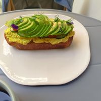 Avocado and tofu scrambled eggs toast at Raw Nest in Krakow