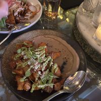 Roasted potatoes and chilaquiles are to the far left   at Ladybird in New York City
