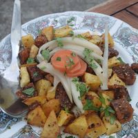 Fried flax bread & potatoes at A Venda in Faro