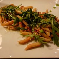 Pasta with peas cream, courgette, raspberries and cashews at L'arte in Cucina in Dusseldorf