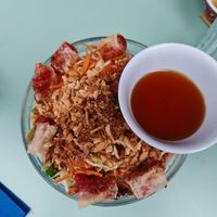 Homemade brioche bread, mint and celery leaves, coleslaw, roasted eggplant, tomato and dill, served with fries. at Primeur Cantine in Paris