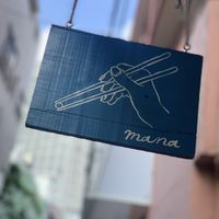 Outside sign at Mana in Naha