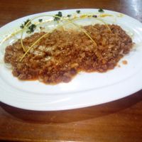 Bolognese pasta with vegetable meat and vegan parmesano. at Espiritu Libre in Valencia