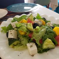 Greek salad with homemade vegan feta at Veggie House in Astana